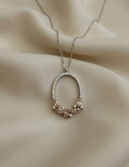 ipeksi fon şeftali taşlı yaprak motifli elips gümüş kolye